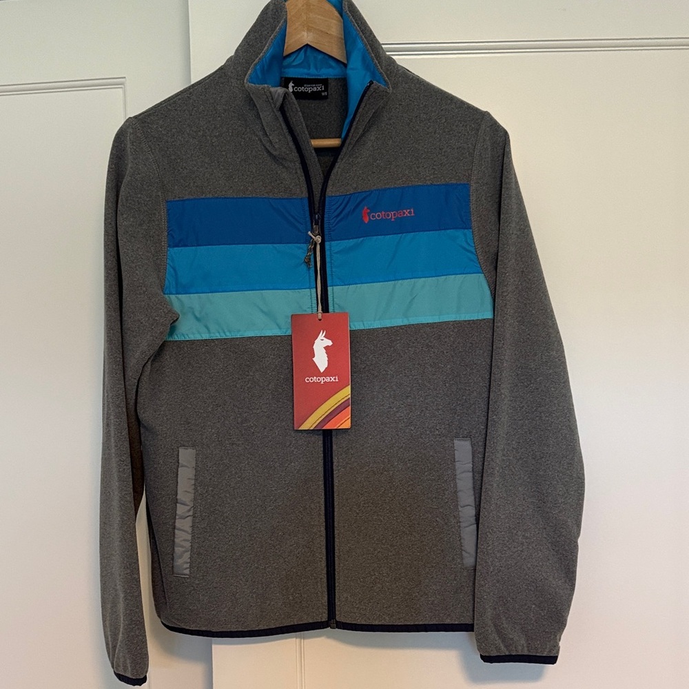 Cotopaxi Gray Jacket with Blue Stripes. Women’s small